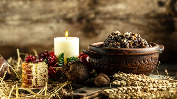 Bowl with kutia Fasting food for the evening meal. Kutia - traditional food for Christmas Ukraine, Belarus and Poland, on wooden table.