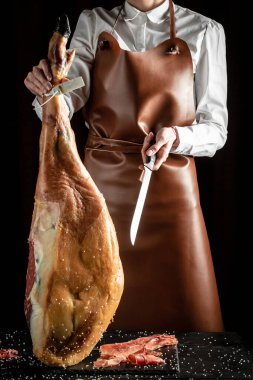Iberian ham cutter. Traditional Spanish ham, Slicing of dry-cured. Hamon is forty-eight weeks old. gastronomic products of Spain. clipart