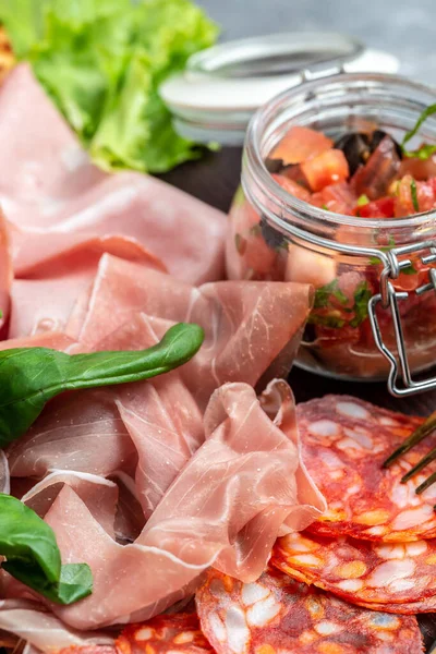Antipasto Platter Cold Meat Plate Prosciutto Slices Ham Salami Basil — Stock Photo, Image