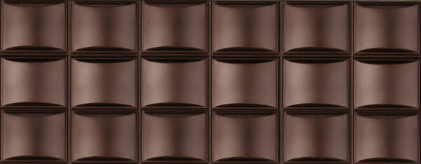 High resolution close-up image of a dark chocolate bar with detailed textured squares, background. The rich brown color, smooth surface.