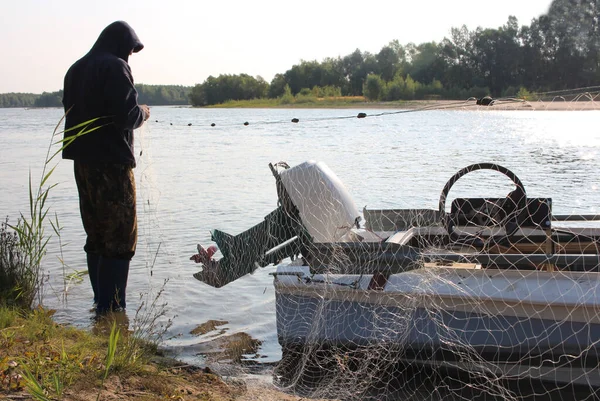 Russia Novosibirsk 2020 Male Poacher Catches Fish Net River Boat — Stock Photo, Image