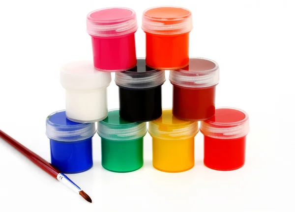 Paints of different colors and slim paintbrush (brush) — Stock Photo, Image