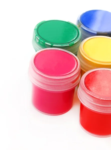 Peintures multicolores pour enfants avec pinceau sur fond blanc — Photo