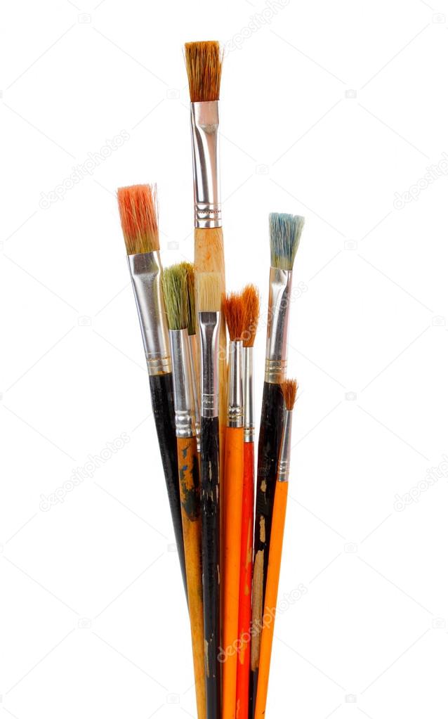 Different dirty paintbrushes of painter