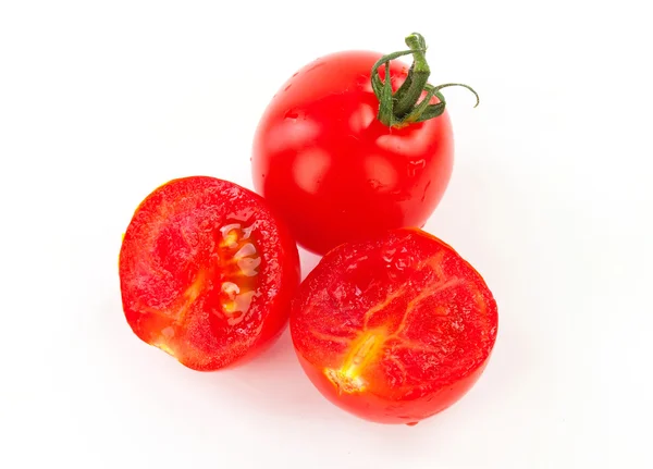 Juicy organic Cherry tomatoes with green leaf isolated over whit — Stock Photo, Image