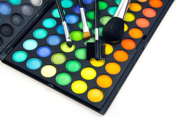 Makeup brushes and make-up eye shadows — Stock Photo, Image