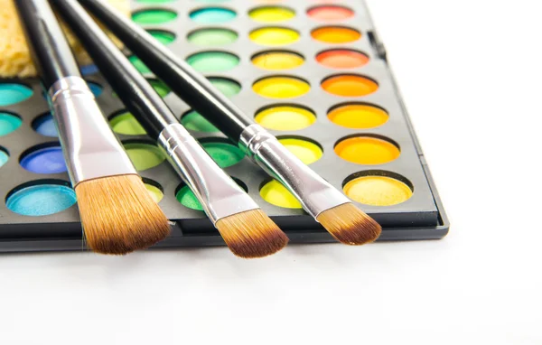 Makeup brushes and make-up eye shadows — Stock Photo, Image