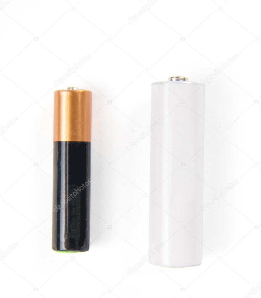 smaller aaa and bigger aa battery on white background
