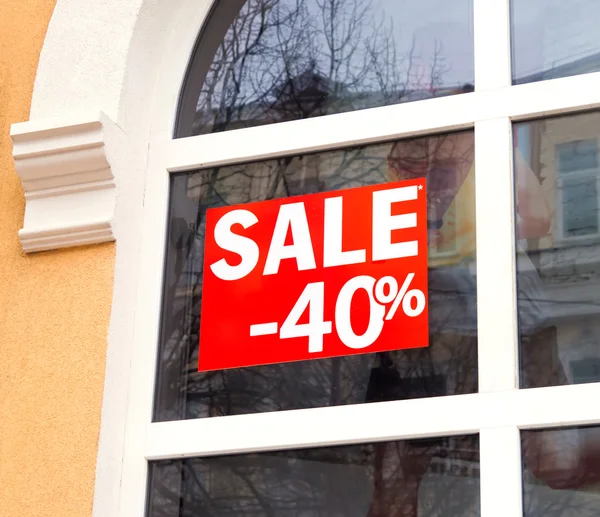 Discount sale sign in the window — Stock Photo, Image