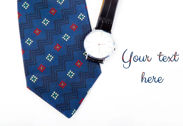 Zegarki klasyczne biznesowe i streszczenie niebieski krawat na w tle — Zdjęcie stockowe