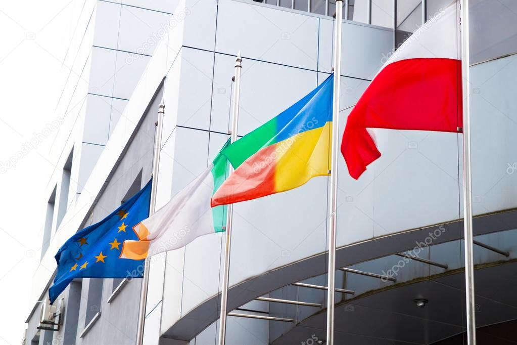The Flags of the European Union, Poland, and other on office bus