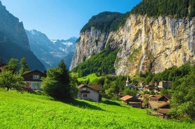 Stunning summer alpine places with deep valley and waterfalls. Lauterbrunnen valley and famous resort, Bernese Oberland, Switzerland, Europe