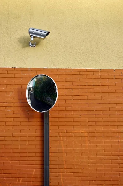 security camera on the wall of the building