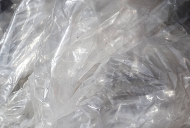 Plastik folyo ve plastik yüzeylerin yüksek çözünürlükteki detaylı görünümünü kapat