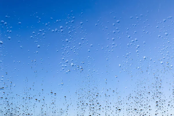Regentropfen Die Großaufnahme Ein Fenster Hinunterlaufen — Stockfoto