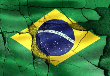 Kırık bir duvara, ulusal istikrarsızlığı ve zorlukları simgeleyen Brezilya bayrağı çizildi