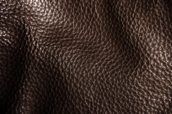 Textur aus dunkelbraunem Leder — Stockfoto
