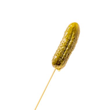 Isolated whole pickle with marinade droplets on a stick clipart