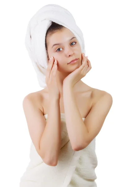 Facial care woman. Nice female after bath massaging her perfect face skin with cream. — Stock Photo, Image