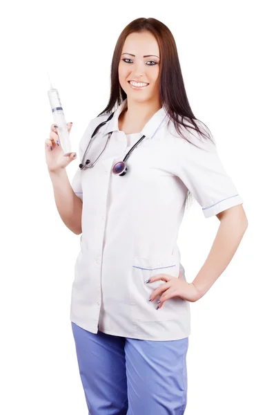 Mulher sorridente médico com uma seringa na mão . — Fotografia de Stock