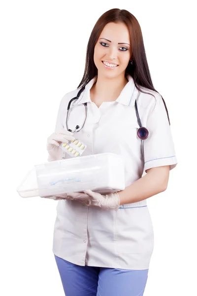 Uma médica com um kit médico. Isolamento . — Fotografia de Stock