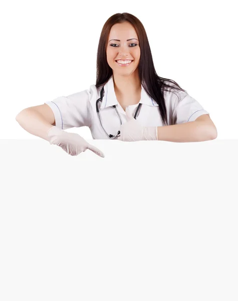 Χαμογελαστή γυναίκα γιατρός με ένα πανό. Απομονωθεί. — Φωτογραφία Αρχείου