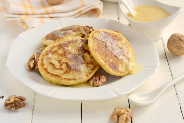 Corn flour pancakes with caramel syrup — Stock Photo, Image