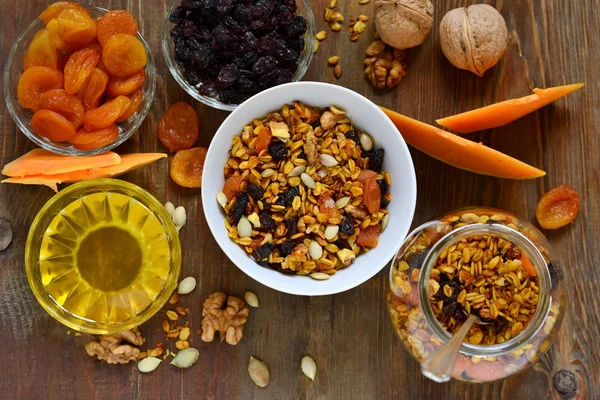 Pumpkin homemade granola with walnuts and dried fruits — Stock Photo, Image