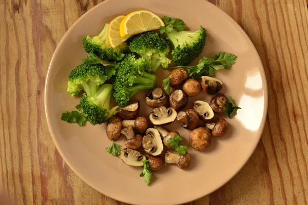 Fried mushrooms with broccoli — Stock Photo, Image