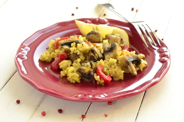 Saffron rice with mushrooms and vegetables — Stock Photo, Image