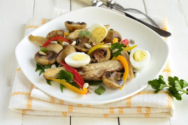 Chicken and mushroom salad with quail eggs and herbs — Stock Photo, Image