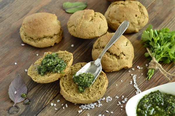 Small rye buns with oil with herbs — Stock Photo, Image