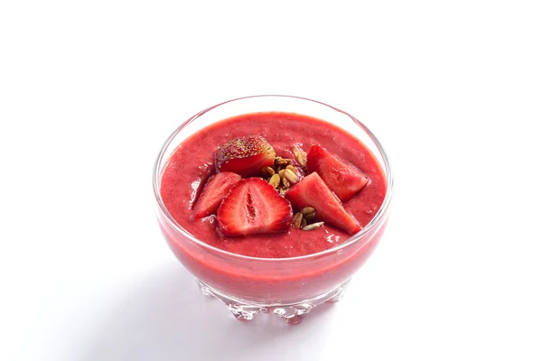 Strawberry milkshake with fresh berries and granola — Stock Photo, Image