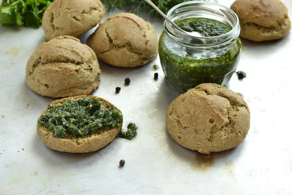 Small rye buns with oil with herbs — Stock Photo, Image