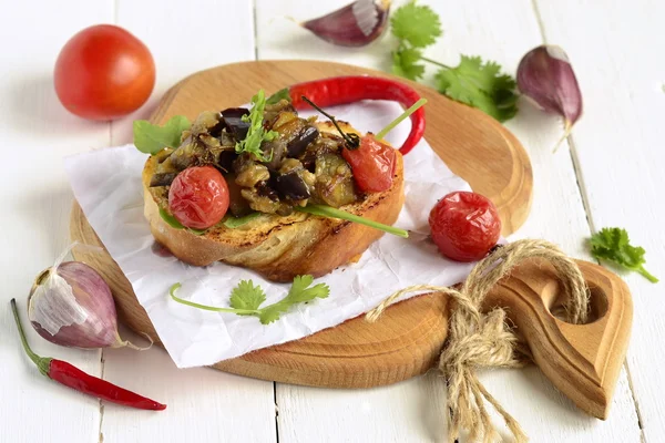 Pate eggplant with dried tomatoes and toast — Stock Photo, Image