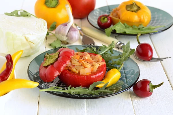 Baked sweet peppers stuffed with vegetables — Stock Photo, Image