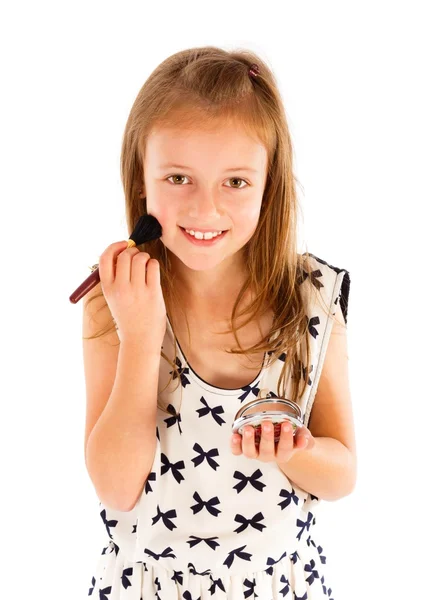Menina aplicando maquiagem — Fotografia de Stock