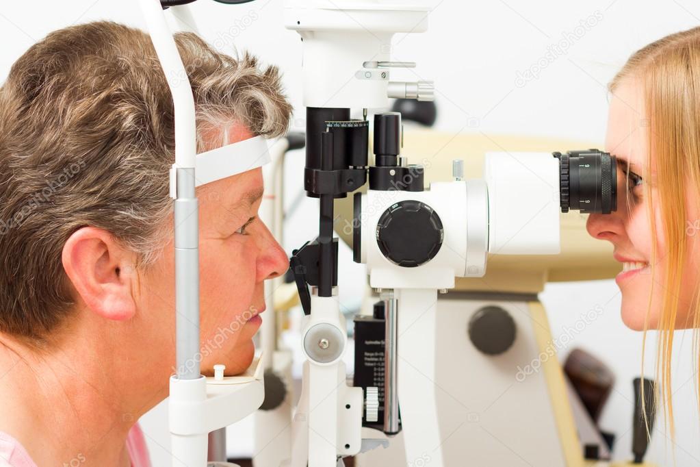 Ophthalmologist and Patient During Examination