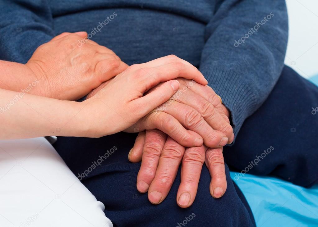 Senior Man With Serious Disease Being Supported