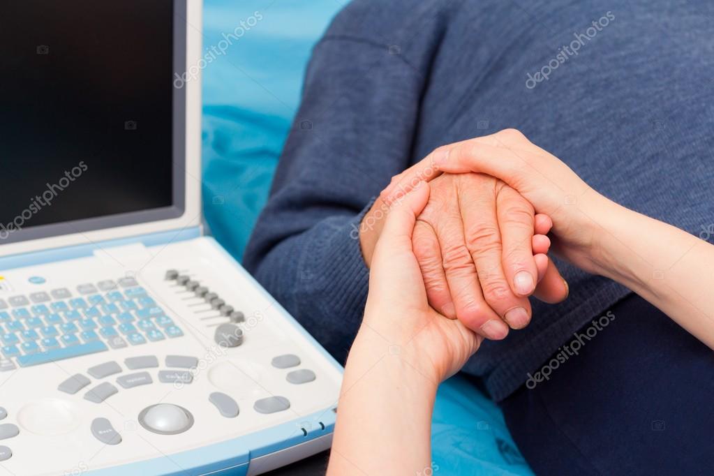 Kind Doctor Supporting Her Patient