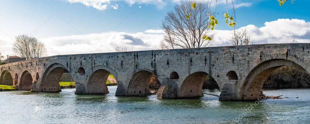 Beziers in France, the Pont Vieux, ancient bridge on the river Orb