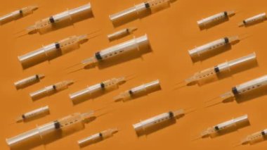 Syringes made of transparent plastic with moving plungers