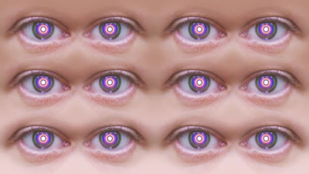Линии человеческих глаз с изменяющимися яркими цветами в зрачках — стоковое видео