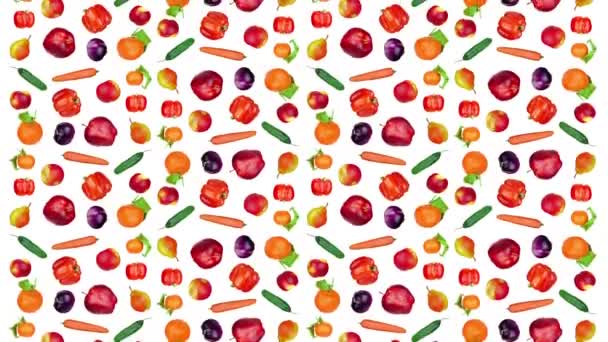 Fruits et légumes savoureux tombent sur un fond blanc — Video