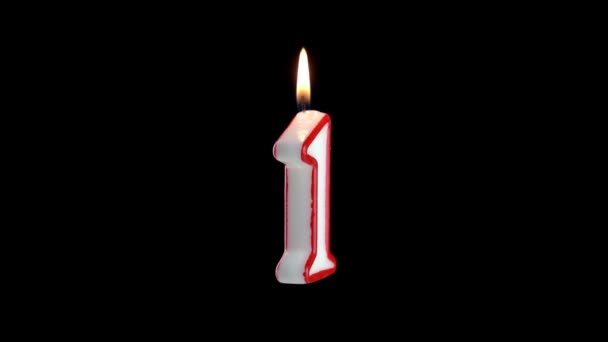 Candle with the number ONE rotates on a white background — Stock Video