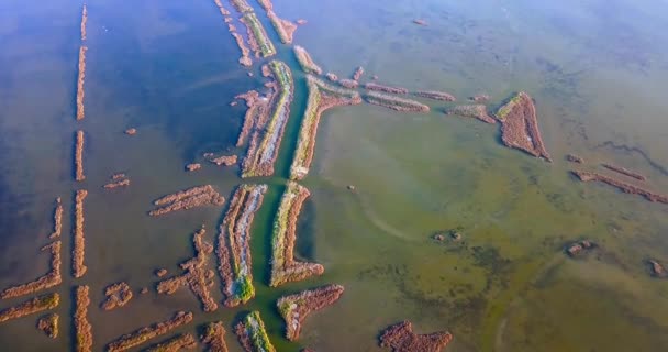 Unspoiled landscape of blue green lagoons with land strips — Stok video