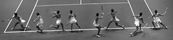 年轻女子打网球. — 图库照片