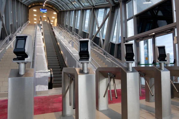 electronic turnstiles for fans to enter the stadium tribune.