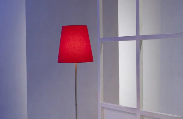 Light with red lamp shade — Stock Photo, Image