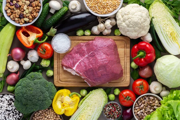 Organic vegetables with fresh piece of beef fillet — Stock Photo, Image